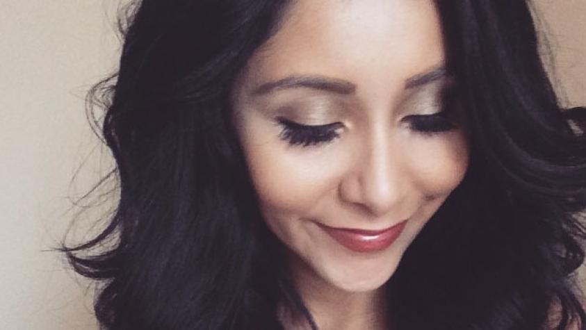 Snooki muestra los resultados de sus inyecciones en los labios